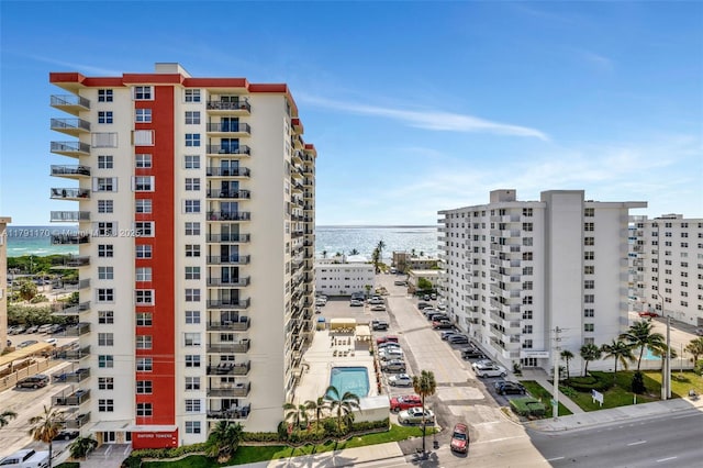 view of property with a water view