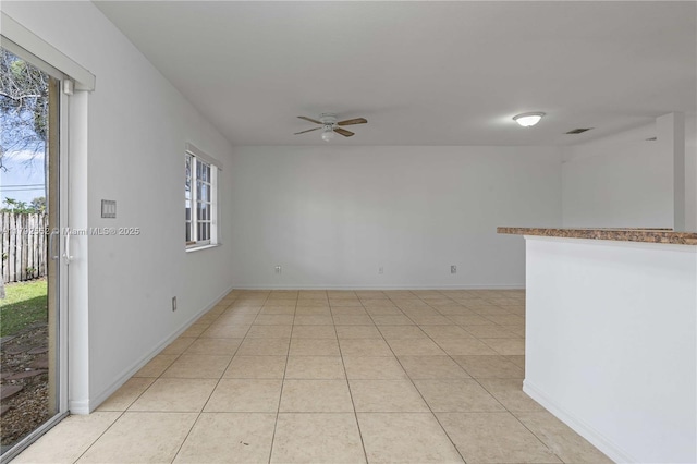 330 SW 2nd Ave Unit 3, Hallandale Beach, FL 33009 - empty room featuring light tile patterned floors, baseboards, ceiling fan, and visible vents