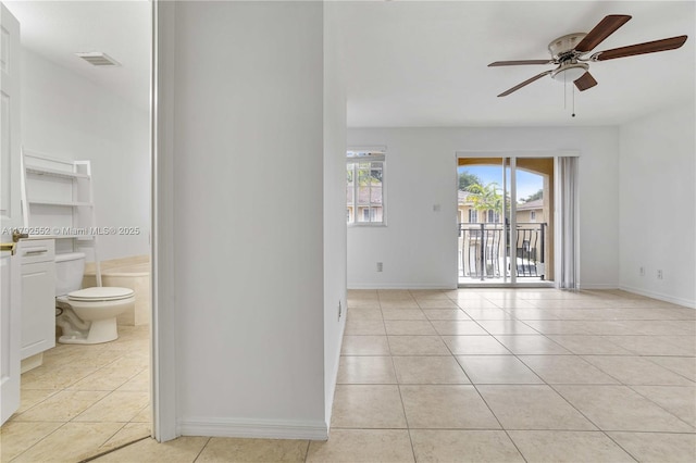 330 SW 2nd Ave Unit 3, Hallandale Beach, FL 33009 - spare room with baseboards, ceiling fan, light tile patterned flooring, and visible vents