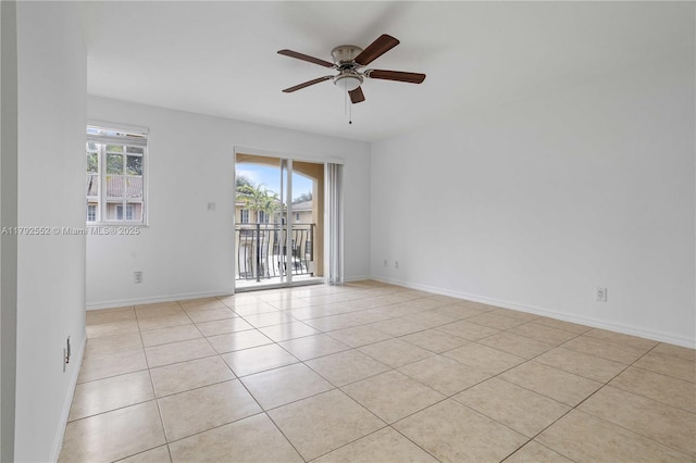 330 SW 2nd Ave Unit 3, Hallandale Beach, FL 33009 - spare room featuring a ceiling fan, baseboards, and light tile patterned floors