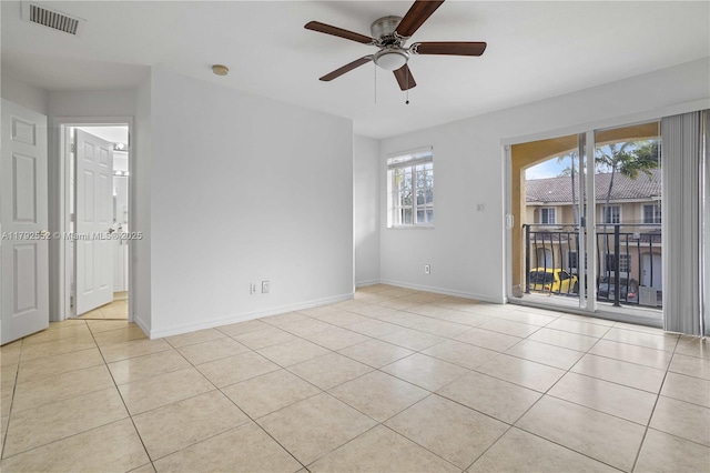 330 SW 2nd Ave Unit 3, Hallandale Beach, FL 33009 - empty room with visible vents, a ceiling fan, baseboards, and light tile patterned floors