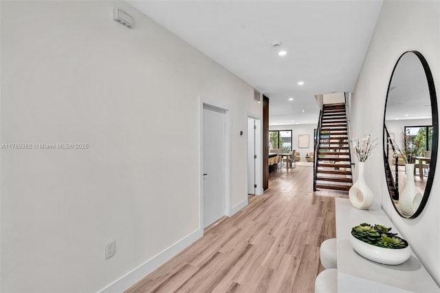 1389 SW 22nd Ter, Miami, FL 33145 - hall with stairway, recessed lighting, light wood finished floors, and a wealth of natural light