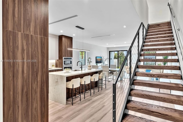 1389 SW 22nd Ter, Miami, FL 33145 - staircase with recessed lighting and wood finished floors