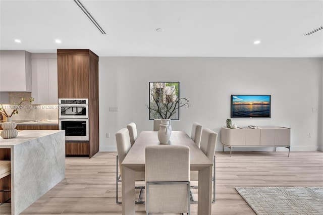 1389 SW 22nd Ter, Miami, FL 33145 - dining space with baseboards, recessed lighting, and light wood-style flooring