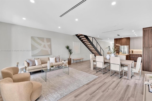 1389 SW 22nd Ter, Miami, FL 33145 - living room with recessed lighting, light wood finished floors, and stairs