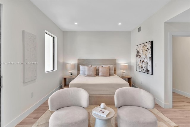 1389 SW 22nd Ter, Miami, FL 33145 - bedroom featuring recessed lighting, baseboards, light wood finished floors, and visible vents