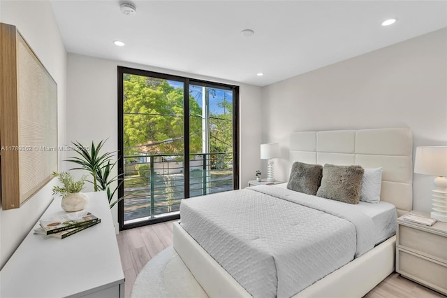1389 SW 22nd Ter, Miami, FL 33145 - bedroom featuring recessed lighting, light wood-style flooring, and access to exterior