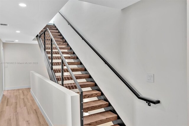 1389 SW 22nd Ter, Miami, FL 33145 - stairway featuring baseboards, recessed lighting, wood finished floors, and visible vents