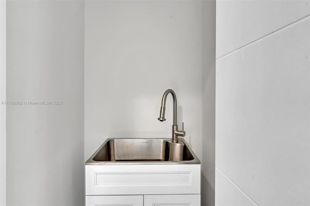 1389 SW 22nd Ter, Miami, FL 33145 - room details with a sink and white cabinets