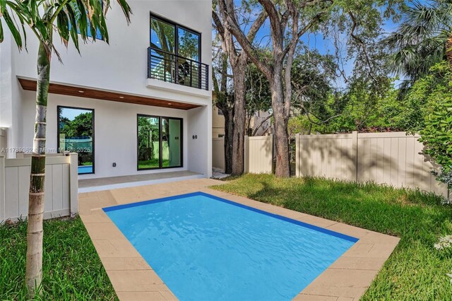1389 SW 22nd Ter, Miami, FL 33145 - view of swimming pool featuring fence and a patio