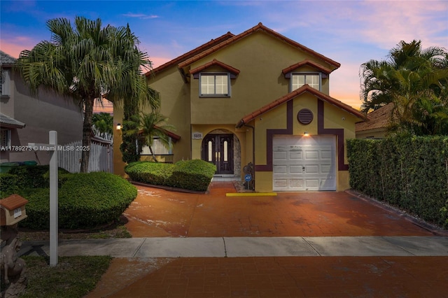 5933 SW 151st Pl, Miami, FL 33193 - mediterranean / spanish house featuring stucco siding and decorative driveway