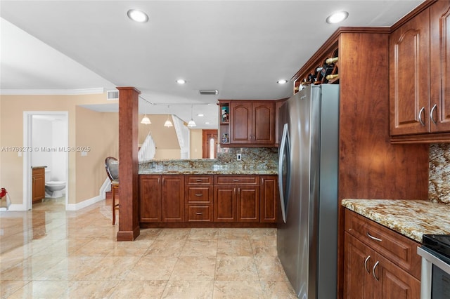 5933 SW 151st Pl, Miami, FL 33193 - kitchen featuring freestanding refrigerator, baseboards, crown molding, light stone counters, and open shelves