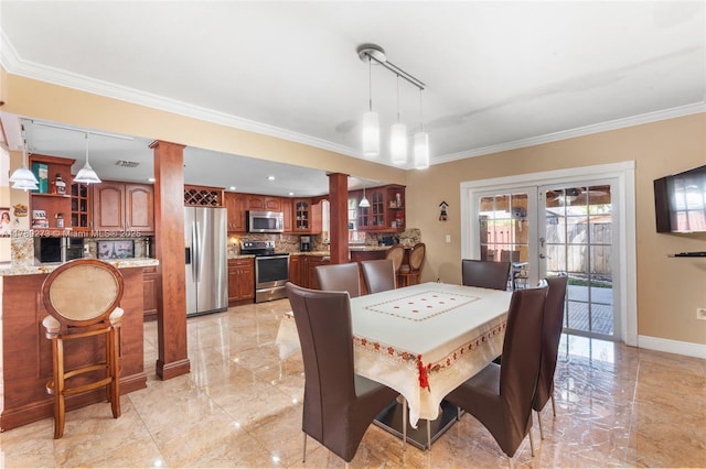 5933 SW 151st Pl, Miami, FL 33193 - dining area featuring decorative columns, french doors, crown molding, light marble finish floors, and baseboards