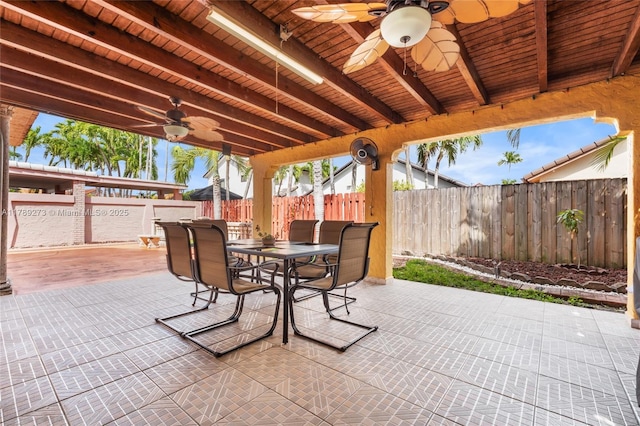 5933 SW 151st Pl, Miami, FL 33193 - fenced backyard featuring a ceiling fan, outdoor dining space, and a patio