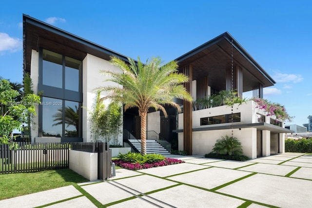 11404 N Bayshore Dr, North Miami, FL 33181 - view of front facade featuring stucco siding