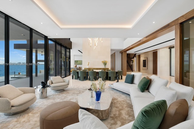 11404 N Bayshore Dr, North Miami, FL 33181 - lobby with expansive windows, stairs, and a water view