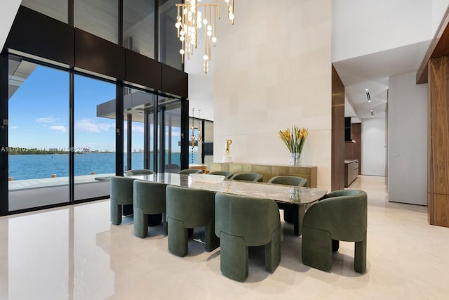 11404 N Bayshore Dr, North Miami, FL 33181 - dining room with a high ceiling and a water view