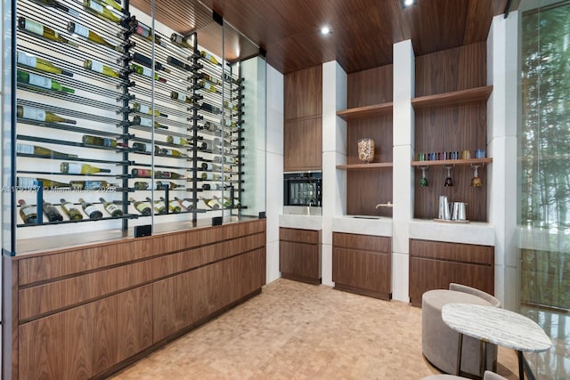 11404 N Bayshore Dr, North Miami, FL 33181 - wine cellar featuring light floors, wooden ceiling, and recessed lighting