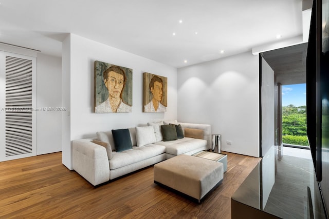 11404 N Bayshore Dr, North Miami, FL 33181 - living area featuring wood finished floors and recessed lighting