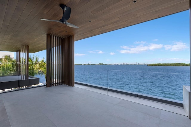11404 N Bayshore Dr, North Miami, FL 33181 - view of patio / terrace featuring a water view and ceiling fan