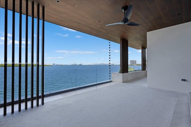 11404 N Bayshore Dr, North Miami, FL 33181 - view of patio featuring a water view and a ceiling fan