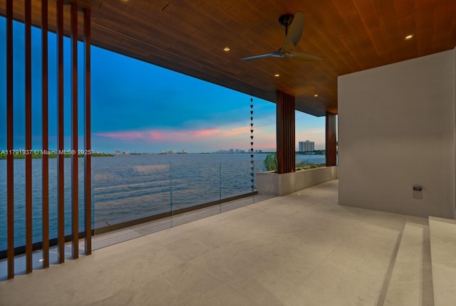 11404 N Bayshore Dr, North Miami, FL 33181 - view of patio featuring a water view and a ceiling fan