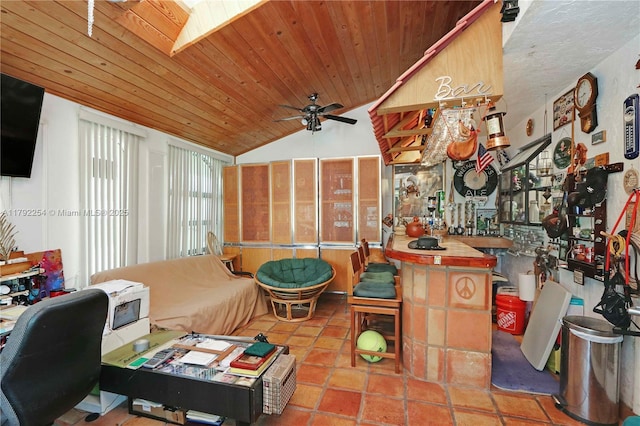 interior space featuring ceiling fan, wood ceiling, and lofted ceiling