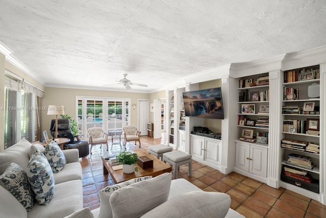 141 Island Dr, Key Biscayne, FL 33149 - tiled living area featuring a ceiling fan, a textured ceiling, and ornamental molding