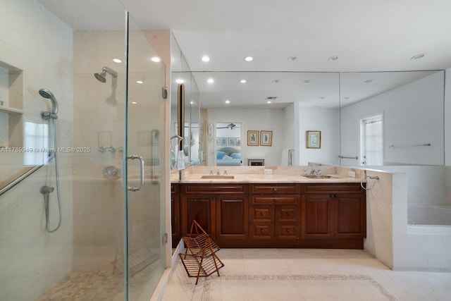 141 Island Dr, Key Biscayne, FL 33149 - full bath featuring a garden tub, a shower stall, a sink, tile patterned floors, and ensuite bathroom