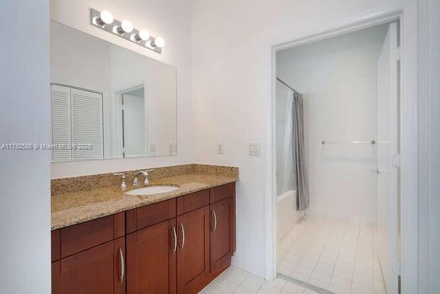 7280 SW 90th St Unit 703, Miami, FL 33156 - full bathroom featuring tile patterned floors, shower / tub combo, and vanity