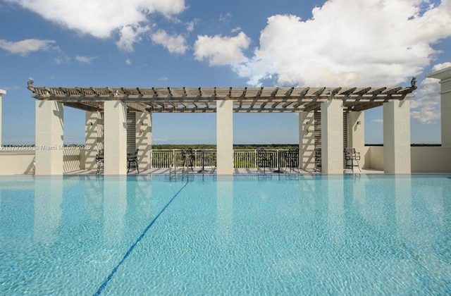 7280 SW 90th St Unit 703, Miami, FL 33156 - community pool featuring fence, a pergola, and a water slide