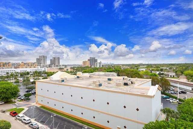 7280 SW 90th St Unit 703, Miami, FL 33156 - drone / aerial view featuring a city view