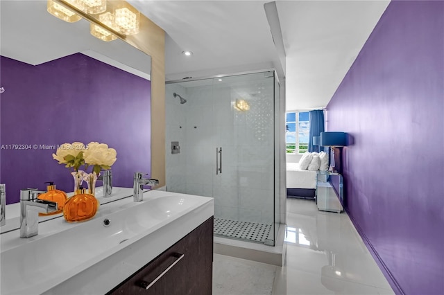 bathroom featuring vanity, recessed lighting, and a shower stall