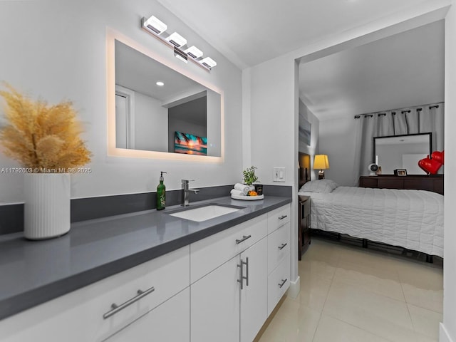 bathroom featuring vanity and tile patterned flooring