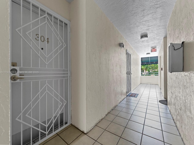 property entrance with stucco siding