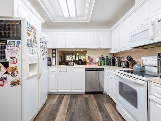 kitchen with a sink, light countertops, white cabinets, white appliances, and dark wood-type flooring