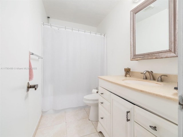 bathroom featuring vanity, tile patterned flooring, shower / bath combo, and toilet