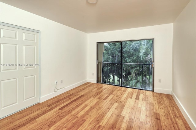 3905 Adra Ave Unit J-46B, Doral, FL 33178 - empty room featuring hardwood / wood-style floors and baseboards