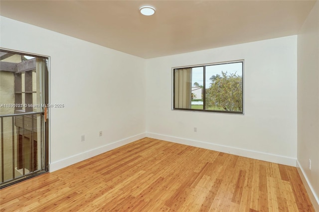 3905 Adra Ave Unit J-46B, Doral, FL 33178 - unfurnished room featuring light wood-type flooring