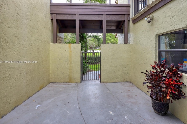 3905 Adra Ave Unit J-46B, Doral, FL 33178 - view of patio / terrace with a gate