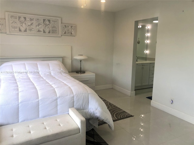 1101 Bahama Bnd Unit B2, Coconut Creek, FL 33066 - tiled bedroom featuring baseboards and ensuite bathroom