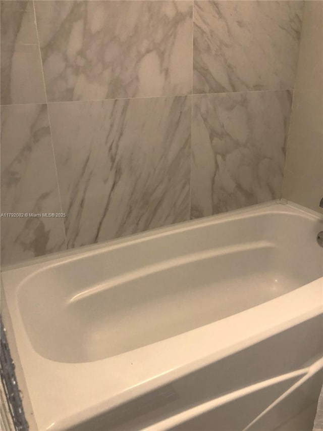 1101 Bahama Bnd Unit B2, Coconut Creek, FL 33066 - bathroom with a tub