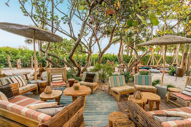 view of patio / terrace featuring an outdoor living space and a deck