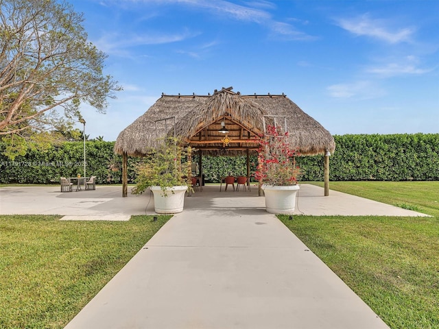 surrounding community featuring a yard and a gazebo