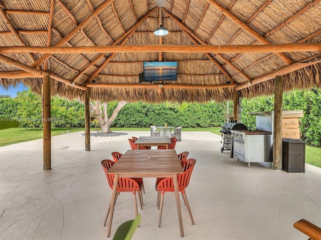 view of patio / terrace with a gazebo and a grill