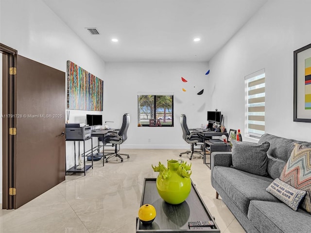 living room with recessed lighting and visible vents