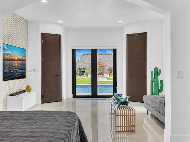 bedroom with baseboards, french doors, and recessed lighting