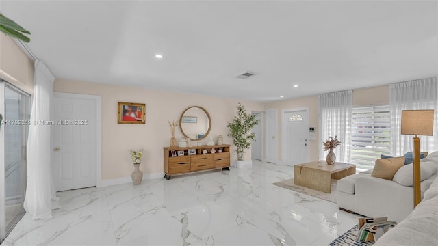 living room with recessed lighting, baseboards, visible vents, and marble finish floor
