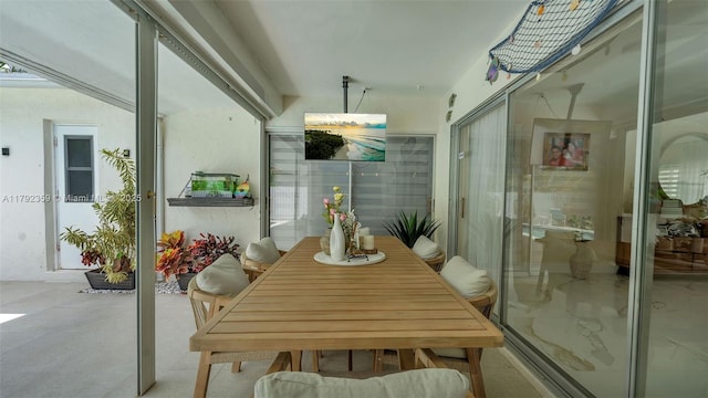 exterior space featuring a patio and outdoor dining area