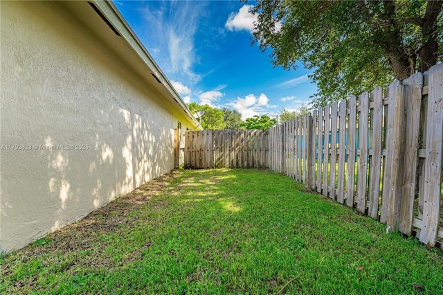 view of yard featuring a fenced backyard